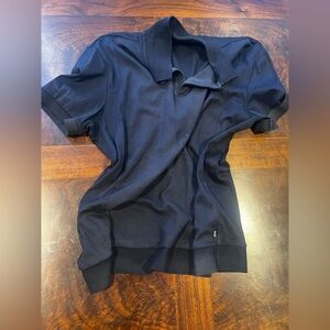 Hugo Boss black Polo Shirt luxury fabric banded bottomAlways looks clean & neat.